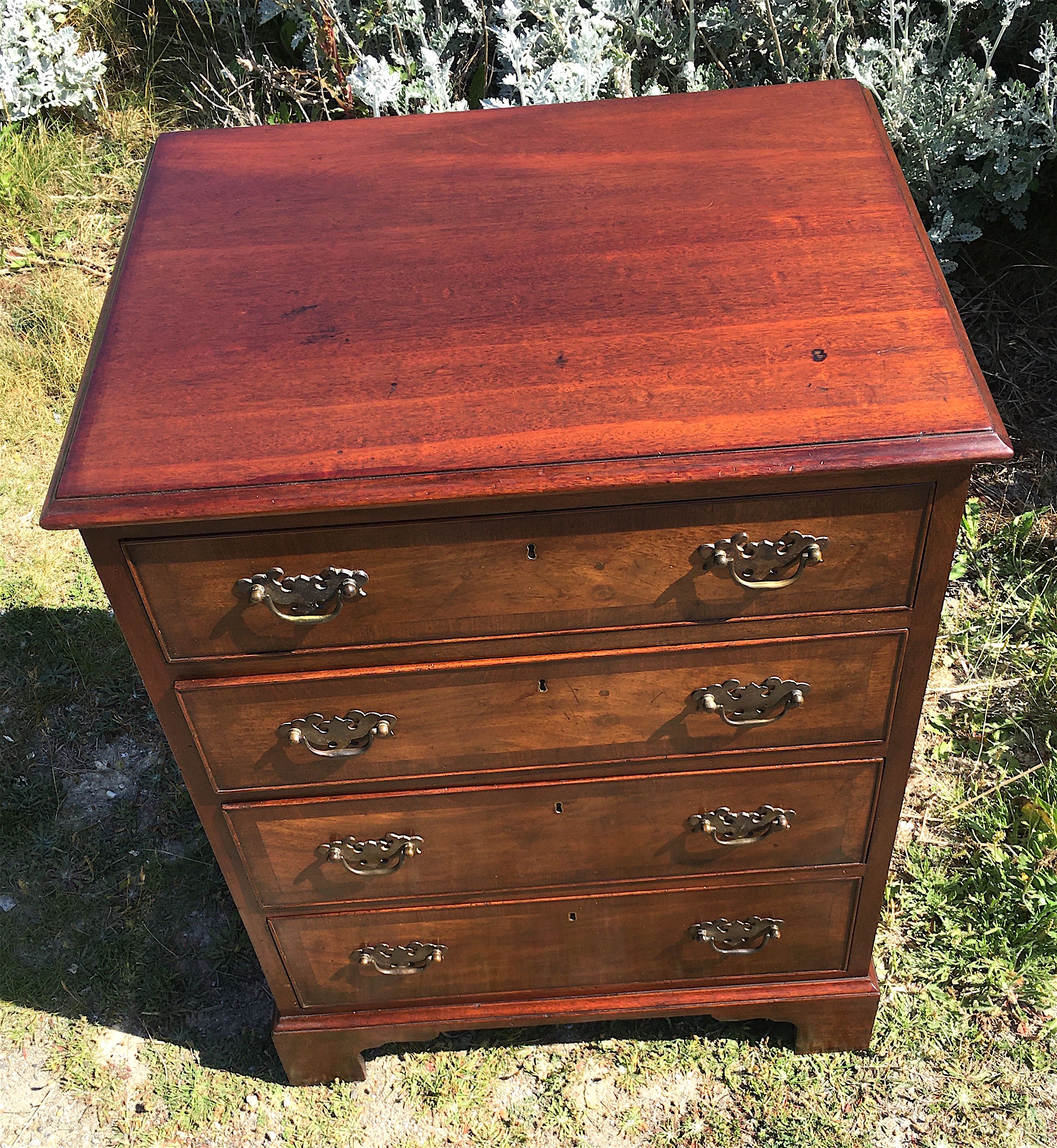 A small George III style mahogany chest, width 60cm, depth 46cm, height 78cm